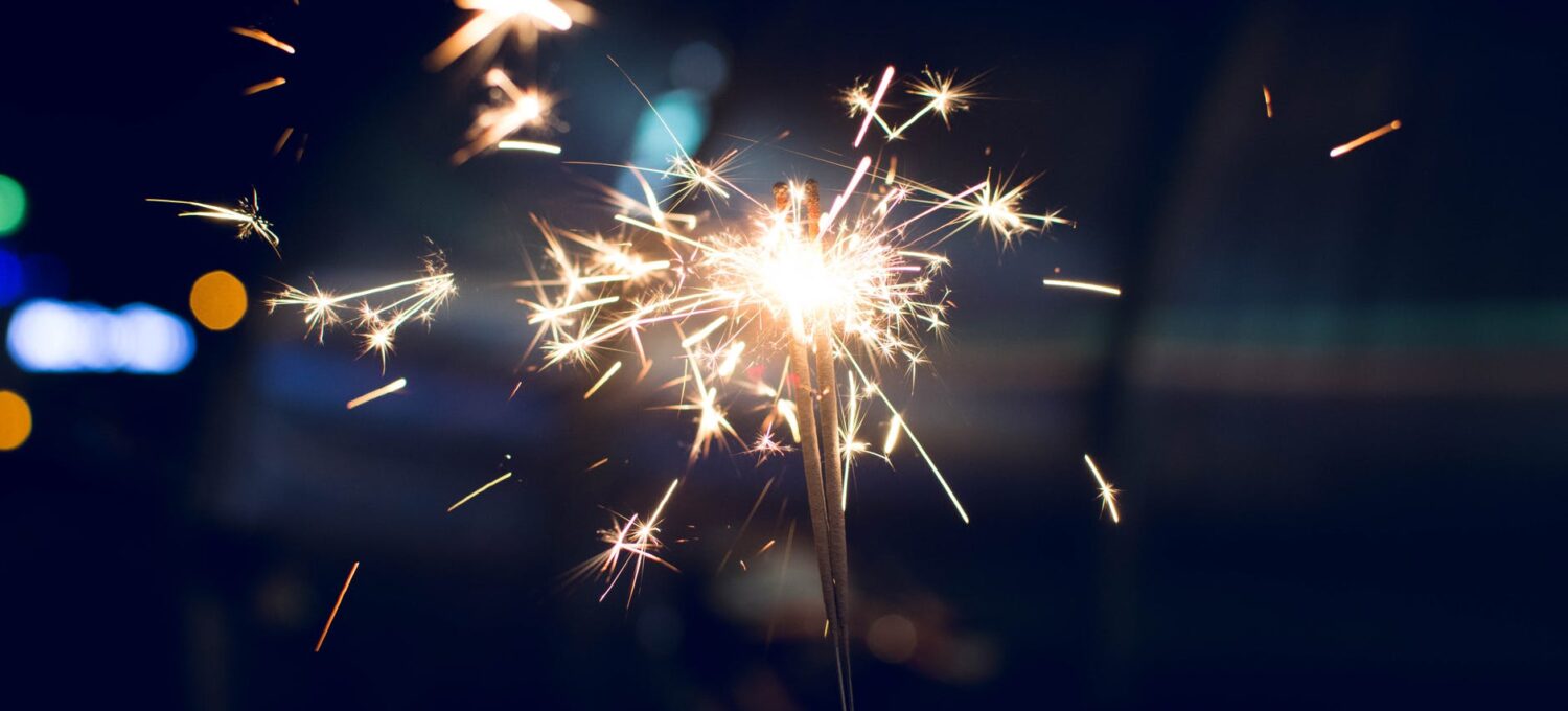 selective focus photography of sparkler